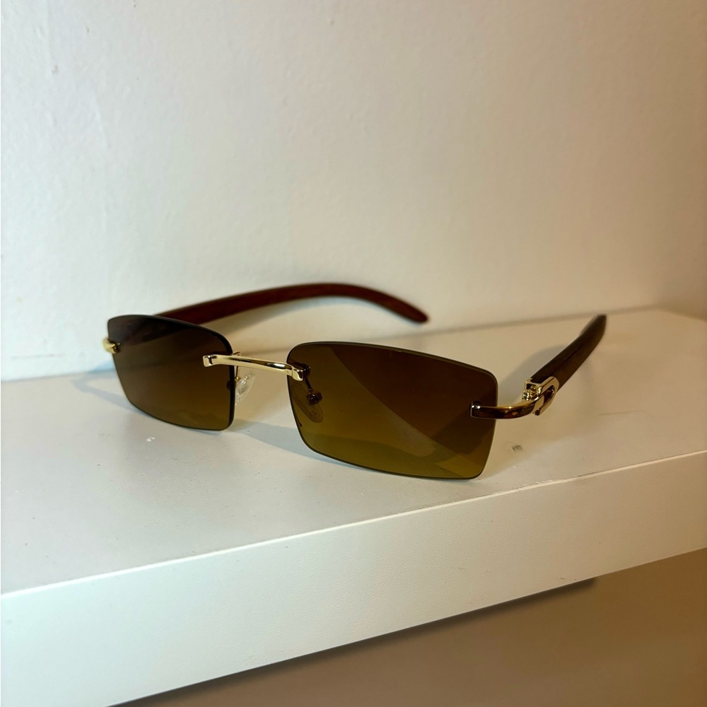Brown rimless sunglasses